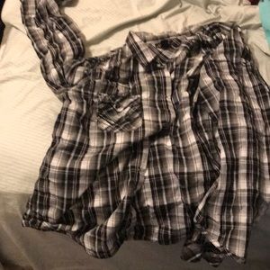 grey, black, and white plaid shirt fits larges.